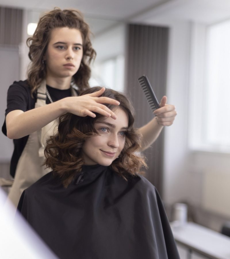 hairdresser-taking-care-her-client